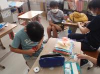 (職場体験学習：丹東中生　1年玉井咲采さん,2年佐々木雅さん,3年佐々木悠良さん,4年佐伯千紘さん)